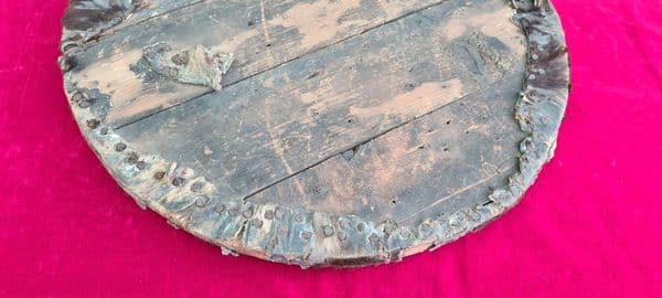 A rare Scottish 18th-19th century wooden battle shield or TARGE covered with brass studs. Ref 3623.